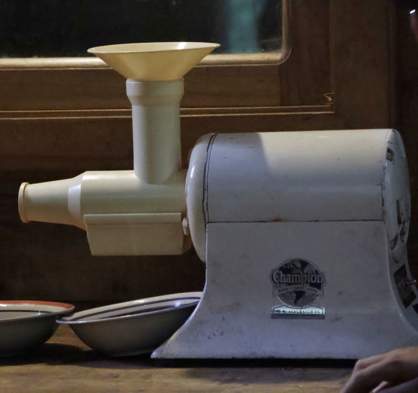 The hand-fed grinder used to turn nibs into cacao liquor on the farm